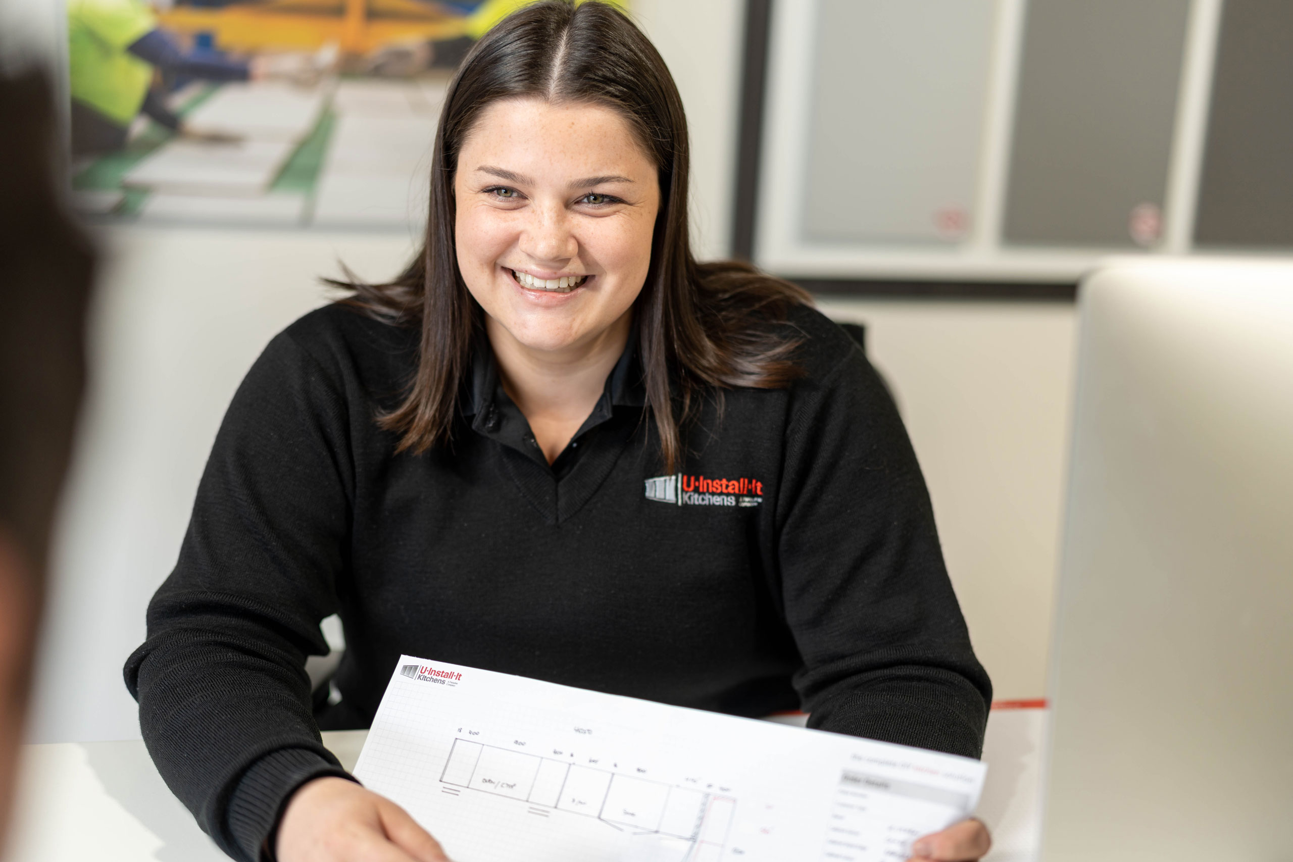 Image of a friendly sales consultant at U-Install-It Kitchens