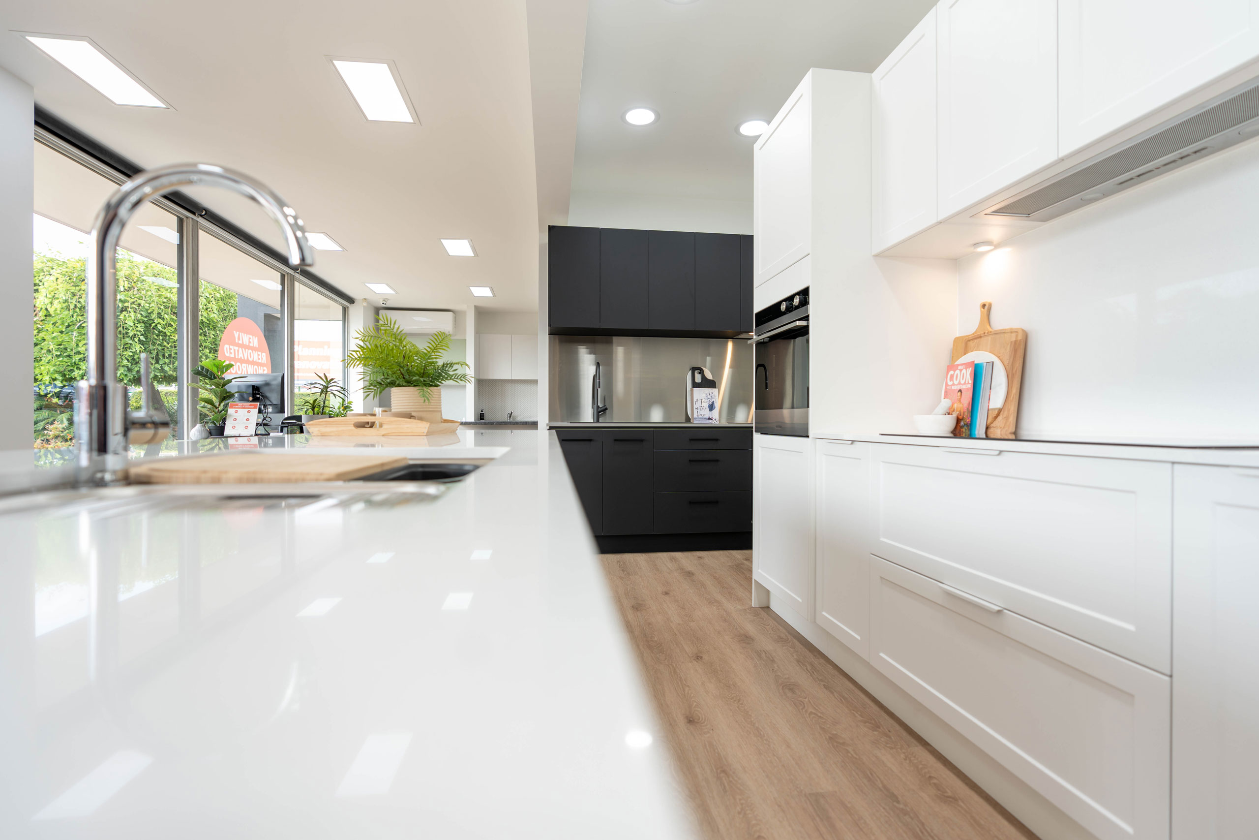 Image of a white kitchen on display in the U-Install-It Kitchens Glandore showroom