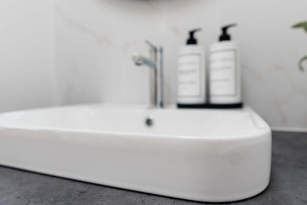Inset basin vanity in gloss white with chrome tapware